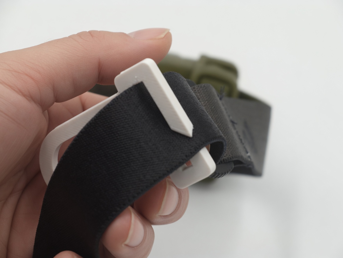 Outer strap segment being threaded back through the buckle