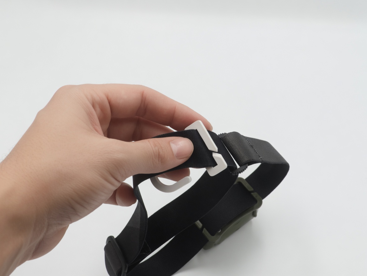 Strap fully threaded through the buckle with the hook secured in place